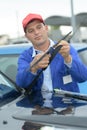 Mechanic ready to change windscreen wiper or mechanic Royalty Free Stock Photo