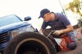 Mechanic repairman making tyre in workshop