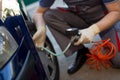 Mechanic repairman making tyre in workshop