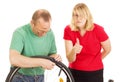 A mechanic repairs a bicycle