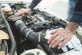 Mechanic repairs the car engine