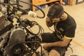 Mechanic Restoring Vintage Engine