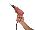 Mechanic screwdriver or drill on hand on white background