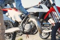 Mechanic serves a motocross motorcycle