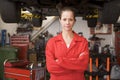 Mechanic standing in garage