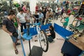 Mechanic teaching people how to repair a bicycle Royalty Free Stock Photo