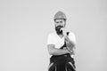 Mechanic think how to fix. our best quality. engineer in uniform. man builder in hard hat. building improvement and Royalty Free Stock Photo