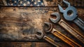 Mechanic Tools and USA Flag on Wooden Background Celebrating Labor Day, a National Holiday