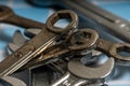 Mechanic tools wrenches lying on checkered workbench surface Royalty Free Stock Photo