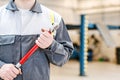 Mechanic with torque wrench. Royalty Free Stock Photo