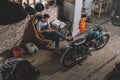 mechanic using digital tablet in repair shop