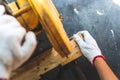 The mechanic is using wood cutting tools in construction Royalty Free Stock Photo