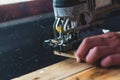 The mechanic is using wood cutting tools in construction Royalty Free Stock Photo