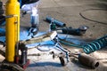 Mechanic welds pipe on corrugation muffler Royalty Free Stock Photo