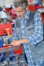 Mechanic working on machinery Royalty Free Stock Photo