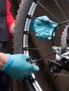 Mechanical adjusting the spokes of a bicycle Royalty Free Stock Photo
