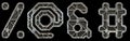 Mechanical alphabet made from rivet metal with gears on black background. Set of symbols percent, at, ampersand and hash