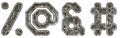 Mechanical alphabet made from rivet metal with gears on white background. Set of symbols percent, at, ampersand and hash