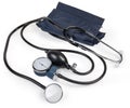 Mechanical aneroid sphygmomanometer and stethoscope on a white background