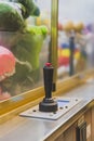 Mechanical claw game machine. Royalty Free Stock Photo