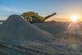 Mechanical conveyor belt to pulverize rock and stone and generate gravel Royalty Free Stock Photo