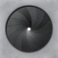 Mechanical iris of a camera lens is the opening mechanism that controls the aperture. Circular blades that create a precision Royalty Free Stock Photo