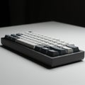 A mechanical keyboard with a compact, minimalist design is placed on a white Royalty Free Stock Photo