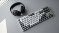 Mechanical keyboard with a white and black color scheme accented by a Royalty Free Stock Photo