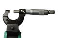 Mechanical micrometer attached on measurement clamp holder appliance, white background