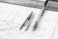 Mechanical pencil and divider on technical drawing Royalty Free Stock Photo