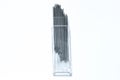 Mechanical pencil leads. Transparent plastic box. Close up. Royalty Free Stock Photo