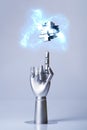 Mechanical robot arm or hand interacts with futuristic digital technologies.