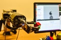 Mechanical Robot Hand Holds a Red Cube in Research Laboratory.