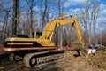 Mechanical shovel in close up unloading earth