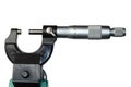 Mechanical micrometer attached on measurement clamp holder appliance, white background