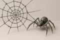 A mechanical spider weaves a web of barbed wire. Royalty Free Stock Photo