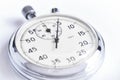 Mechanical stopwatch white background closeup. Royalty Free Stock Photo