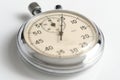 Mechanical stopwatch white background closeup. Royalty Free Stock Photo