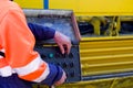 Mechanical technician operating on a control panel Royalty Free Stock Photo