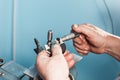 Mechanical technician worker hands measuring detail tool after processing at workshop with sliding caliper manufacturing Royalty Free Stock Photo