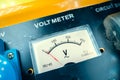 Mechanical voltmeter close up. Voltage measuring device on a gasoline generator