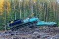 Mechanically driven drill and caterpillar truck Royalty Free Stock Photo