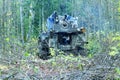 Mechanically driven drill in forest