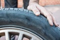 Mechanician changing unfit car tire