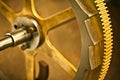 The mechanics of time. Clock gear, gold and vintage wheel cog of golden machinery and gears. Metal, closeup and steel Royalty Free Stock Photo