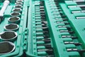 Mechanics Tool Set and Mechanic`s Tool Box close-up. Plastic green Storage Box Case. Mechanics Tool Kit. Tool Box with Tools Royalty Free Stock Photo