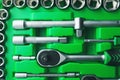 Mechanics Tool Set and Mechanic`s Tool Box close-up. Plastic green Storage Box Case. Mechanics Tool Kit. Tool Box with Tools Royalty Free Stock Photo