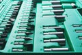 Mechanics Tool Set and Mechanic`s Tool Box close-up. Plastic green Storage Box Case. Mechanics Tool Kit. Tool Box with Tools Royalty Free Stock Photo