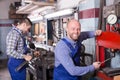 Mechanics working at workshop Royalty Free Stock Photo