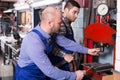 Mechanics working at workshop Royalty Free Stock Photo